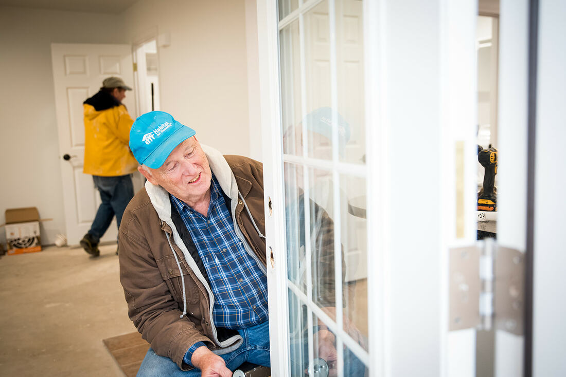 A volunteer working on a Habitat for Humanity build in Ponca City